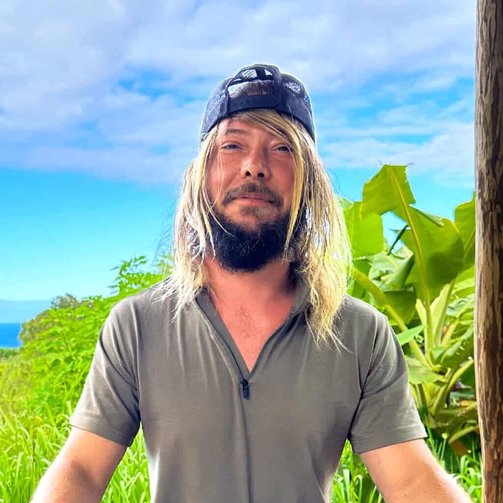 Branden from Rainbow Bridge Hawaii standing outdoors on the Hāmākua Coast
