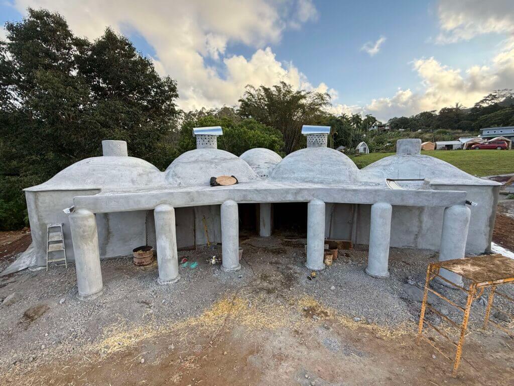 Front view of the Asklepieion under construction at Rainbow Bridge Hawaii, a dome-style healing space